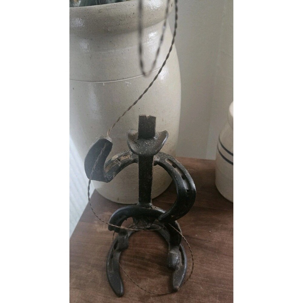Horseshoe Cowboy Sculpture with Welded Rodeo Cowboy Hat and Rope